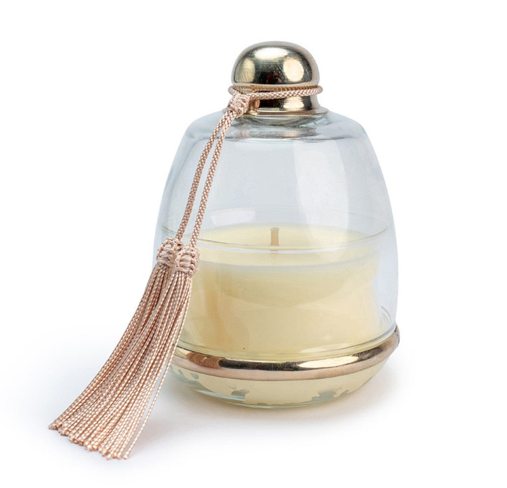 Cloche Rose Oud candle under bell-shaped glass lid with pale pink tasselled knob, rose and woody oud scent