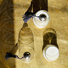 Cloche candle styled in a room setting, bell-shaped glass lid