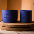 Izza Blue Mandarin candle, matte vivid blue patterned ceramic, mandarin and floral scent