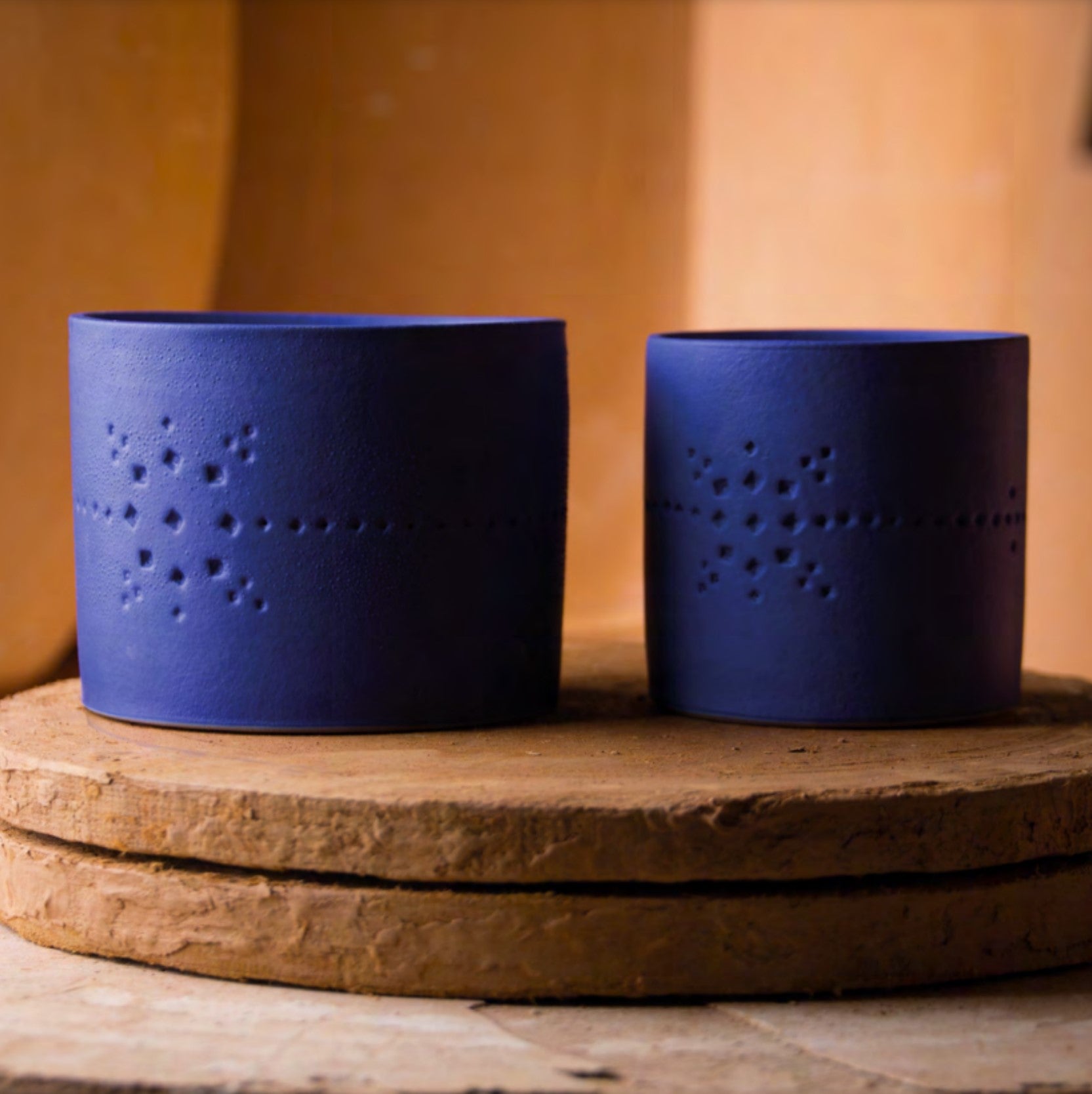 Izza Blue Mandarin candle, matte vivid blue patterned ceramic, mandarin and floral scent