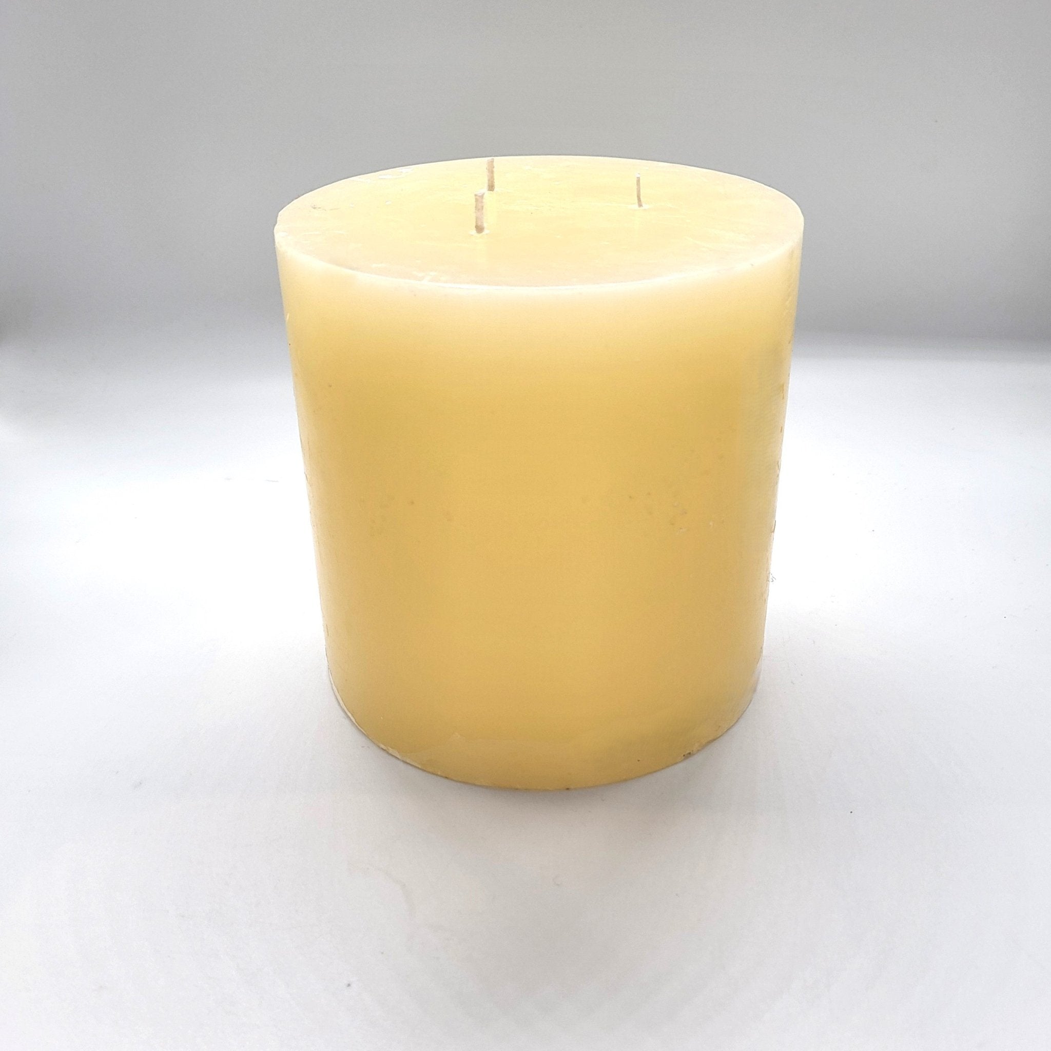 Ivory pillar candle, 15 cm diameter and 15 cm high, three wicks, paraffin wax