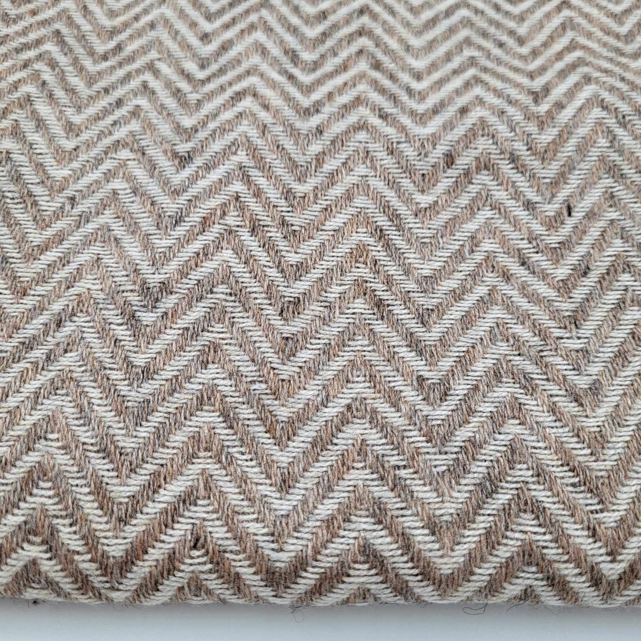 Cashmere herringbone shawl in beige with a natural base