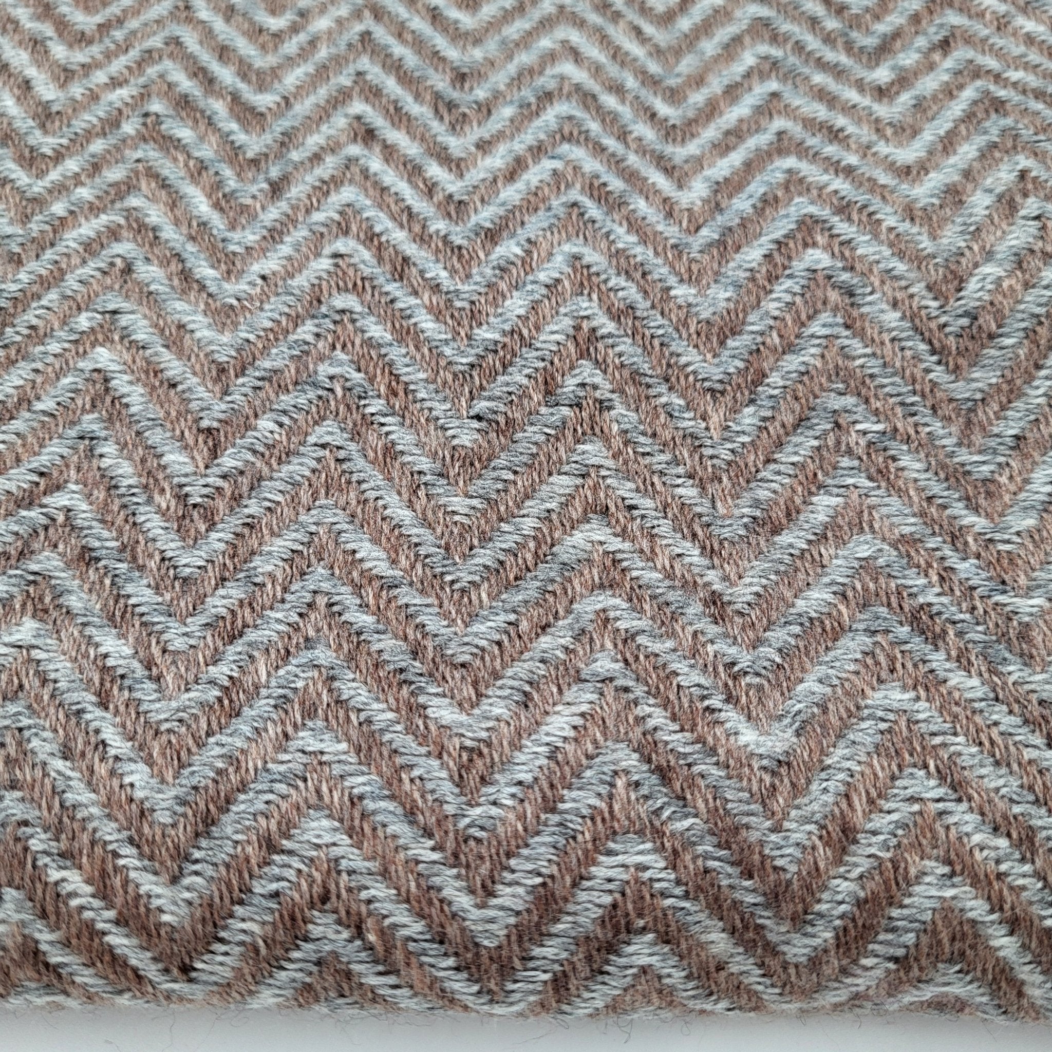 Cashmere herringbone shawl in grey, draped