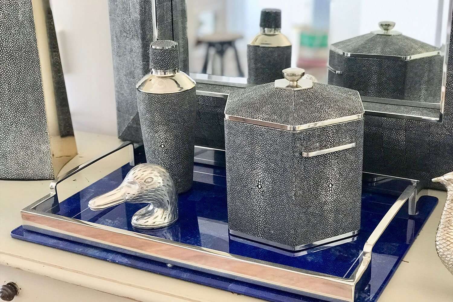 Charcoal faux shagreen cocktail shaker with matching bar accessories, styled