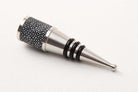 Charcoal faux shagreen bottle stopper, 3 x 3 x 10 cm, styled in a wine bottle