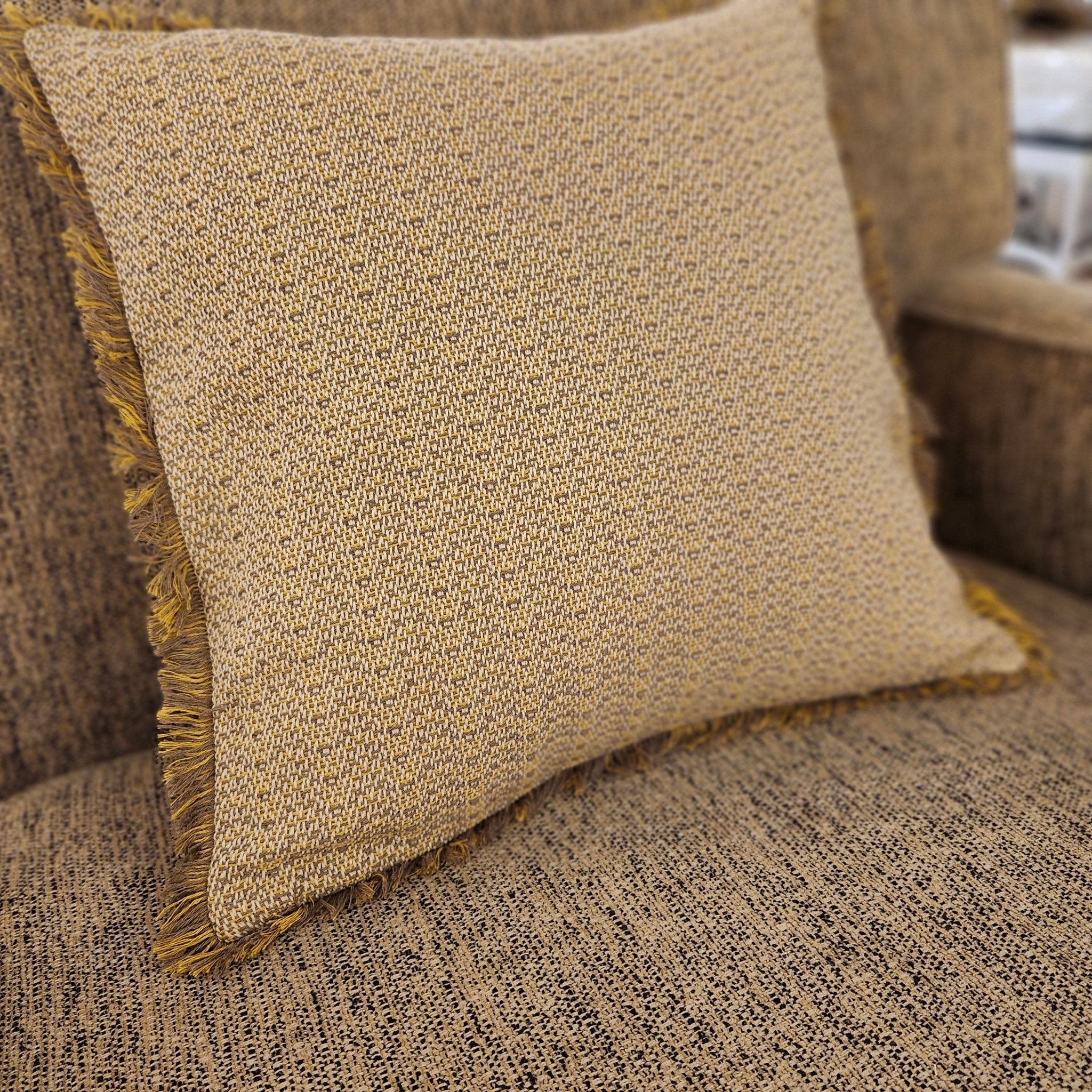 Woven recycled cotton fringe cushion