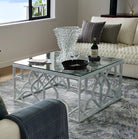 Distressed white carved trellis coffee table