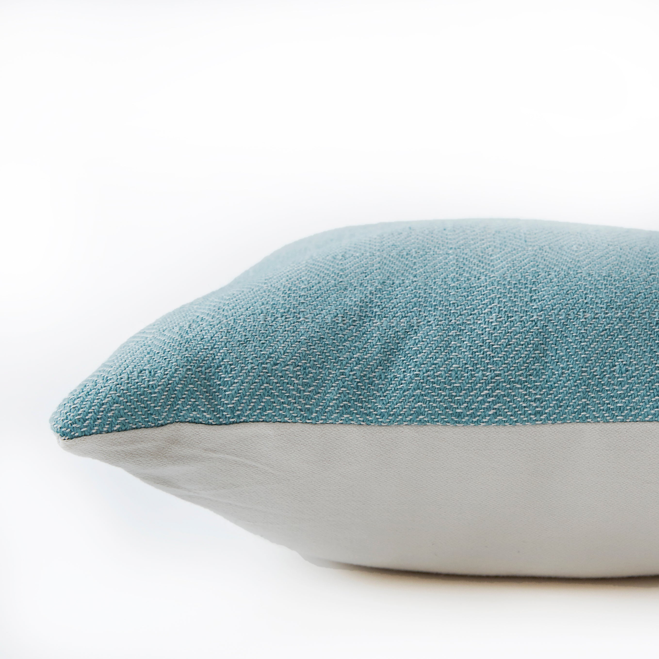 Weaver Green teal diamond cushion, side view