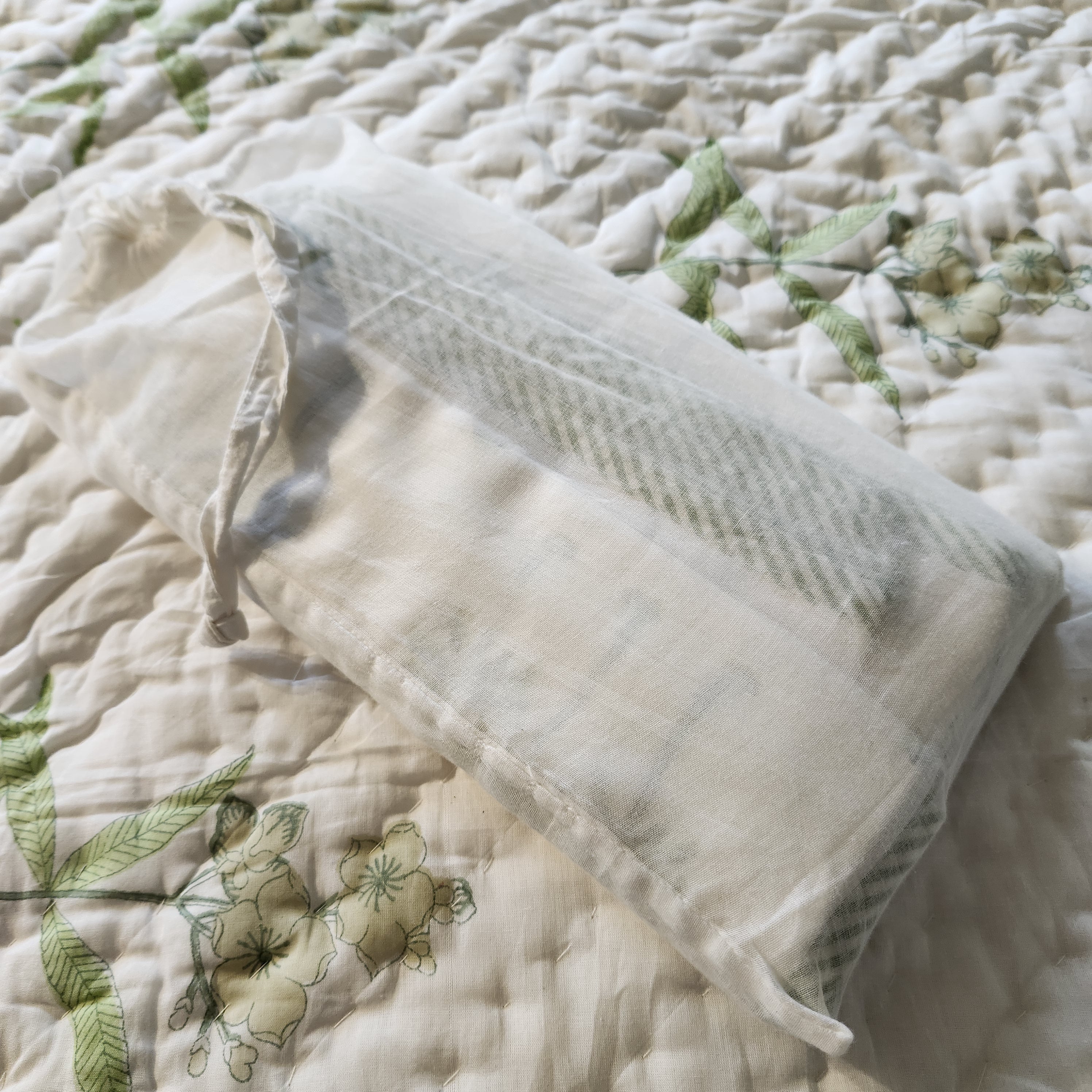 Cotton baby sheet or dohar, in a muslin bag
