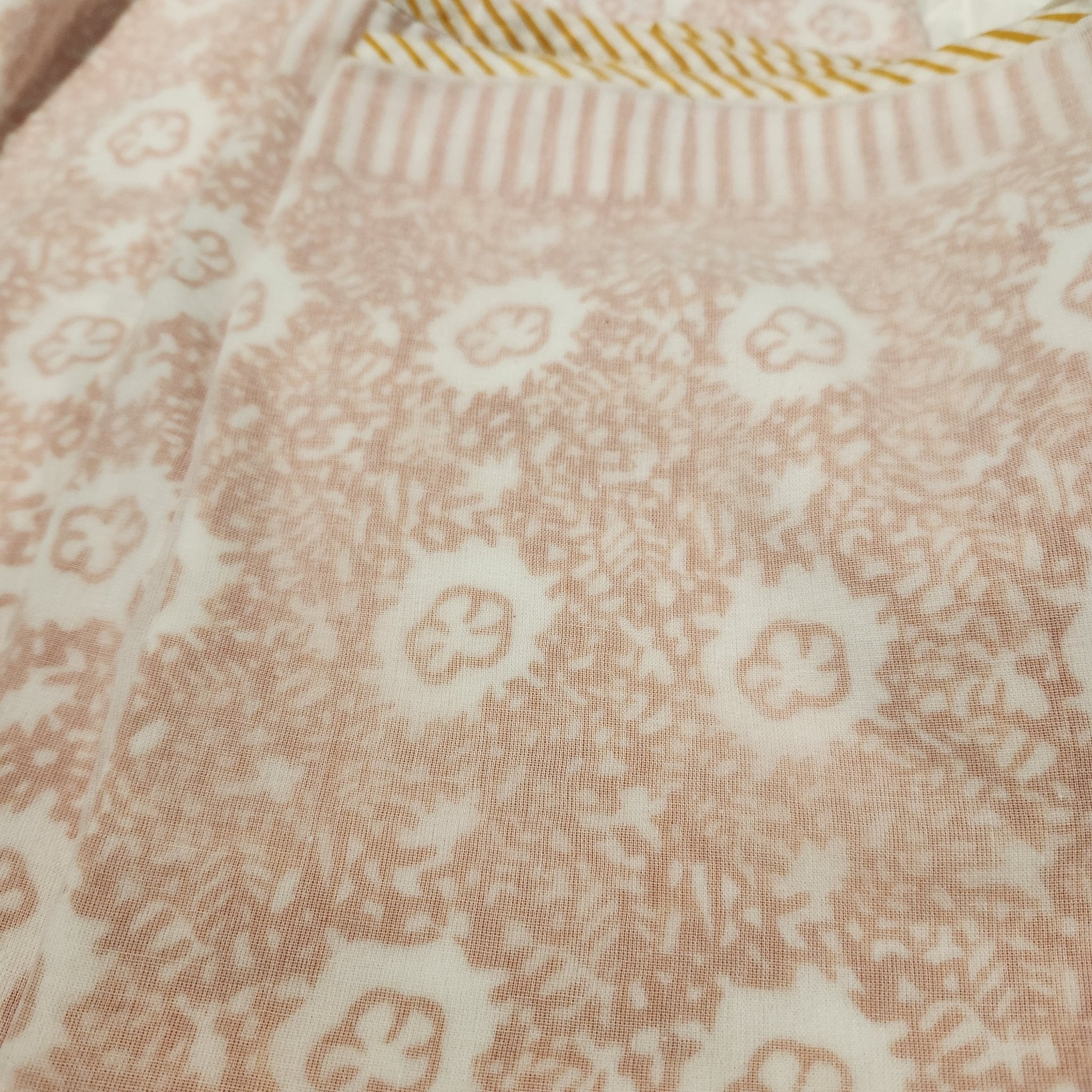 Single block-print cotton dohar blanket in orange, 150 by 225 cm, a light alternative to a duvet
