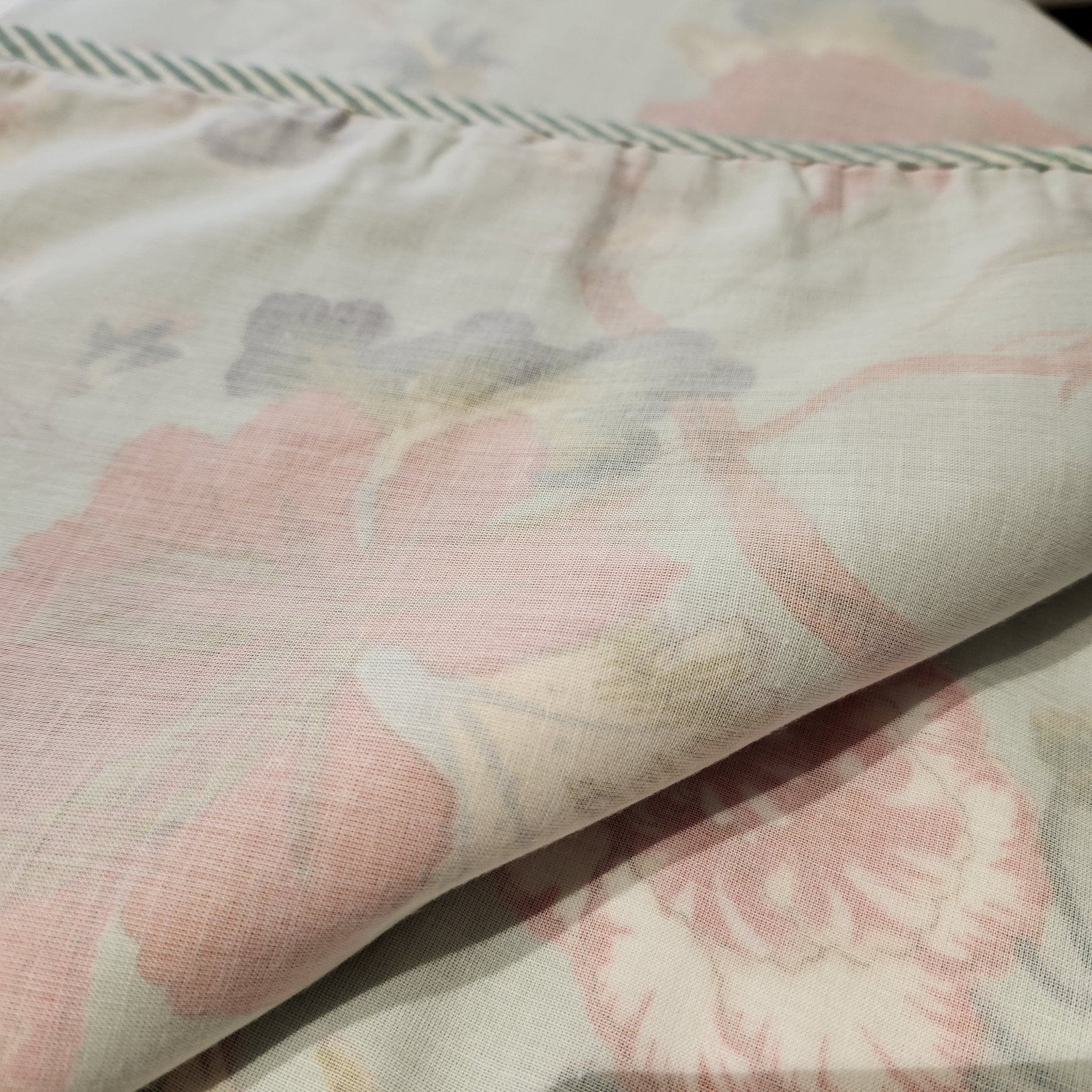 Single block-print cotton dohar blanket with a blue tropical flower print, 150 by 225 cm, machine washable