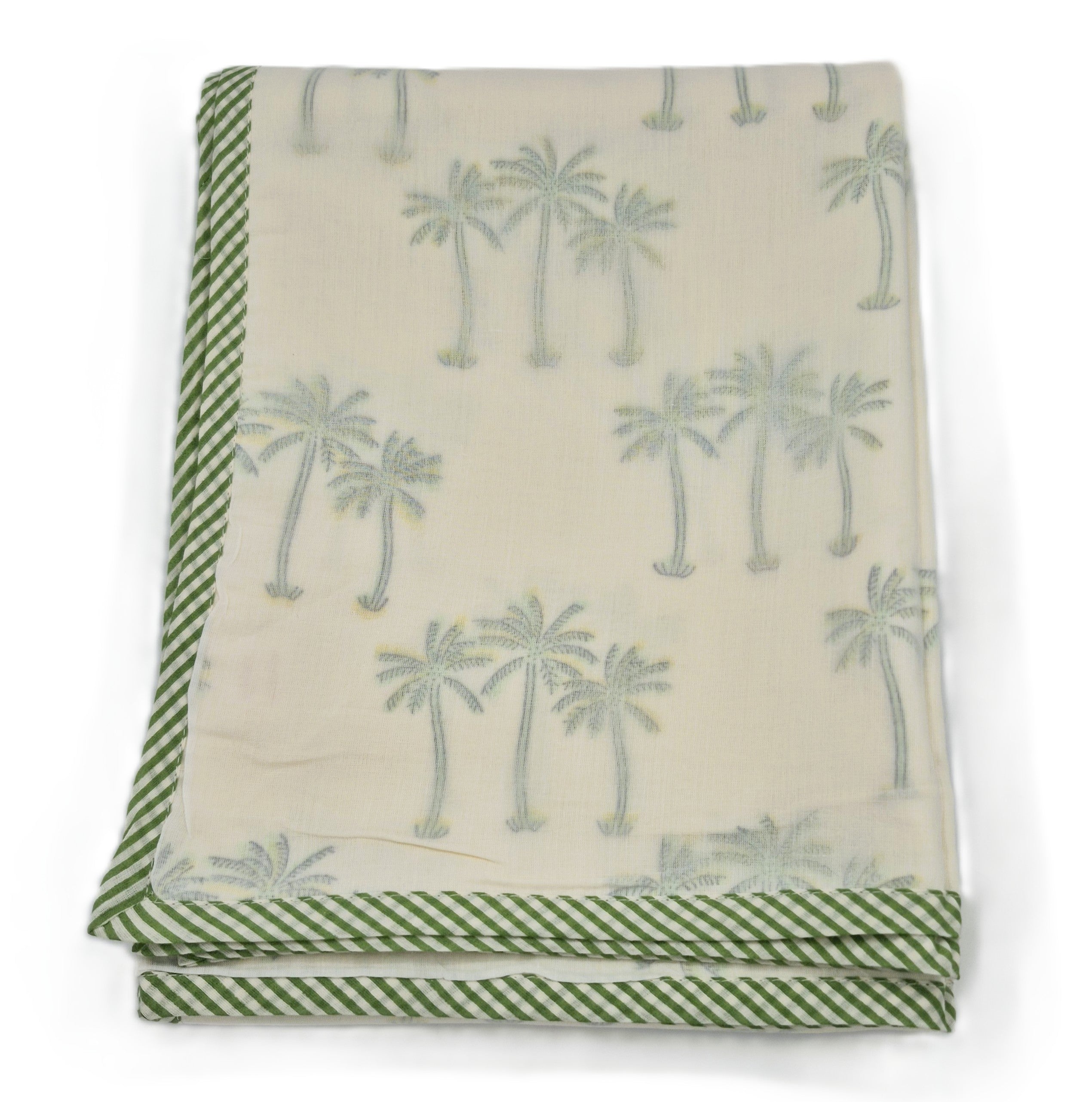 Baby blanket with palm tree pattern and green border on a white background