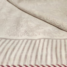 Single block-print cotton dohar blanket in red, 150 by 225 cm, a light alternative to a duvet