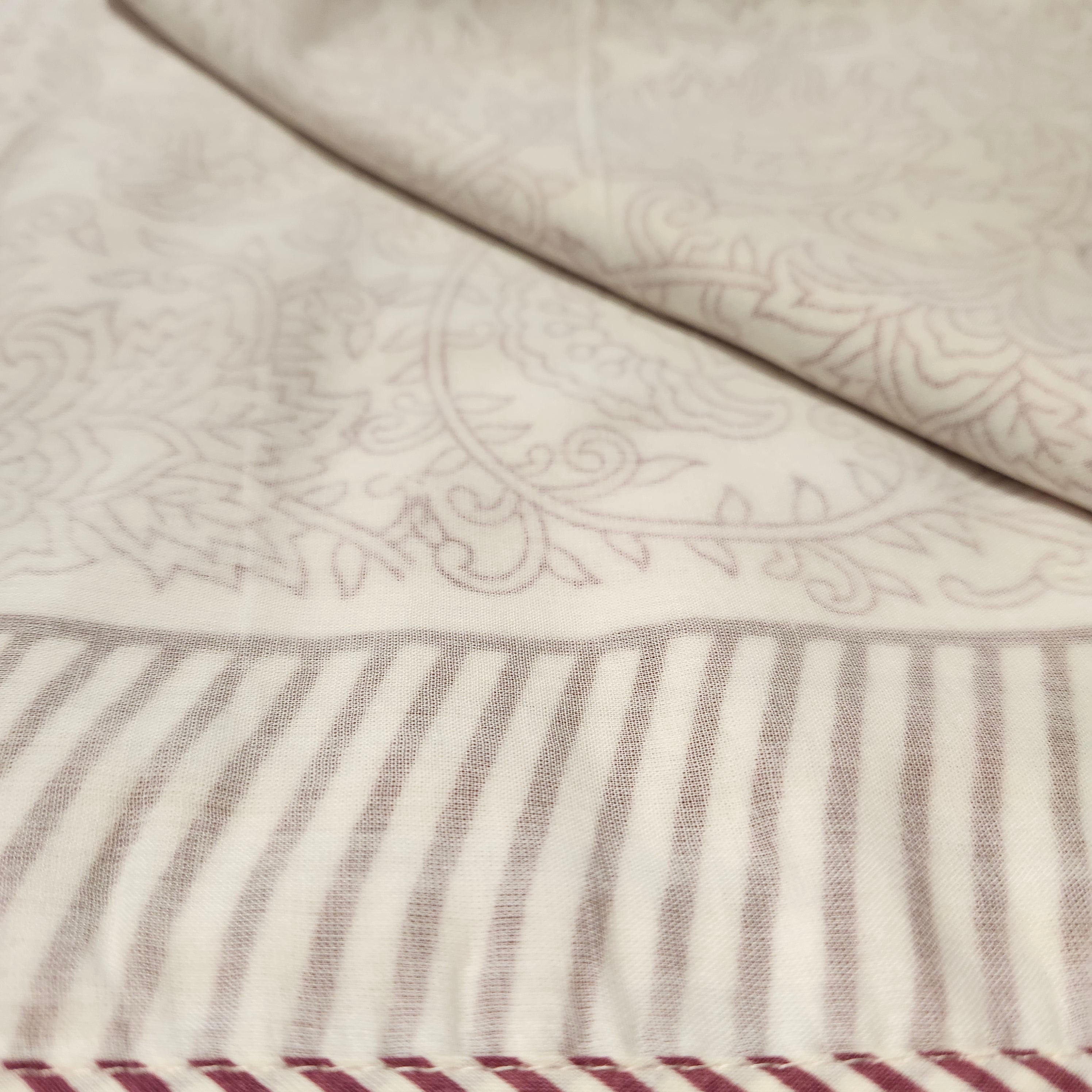 Single block-print cotton dohar blanket in red, 150 by 225 cm, a light alternative to a duvet