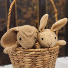 Seagrass basket styled with Easter decorations, handwoven natural seagrass