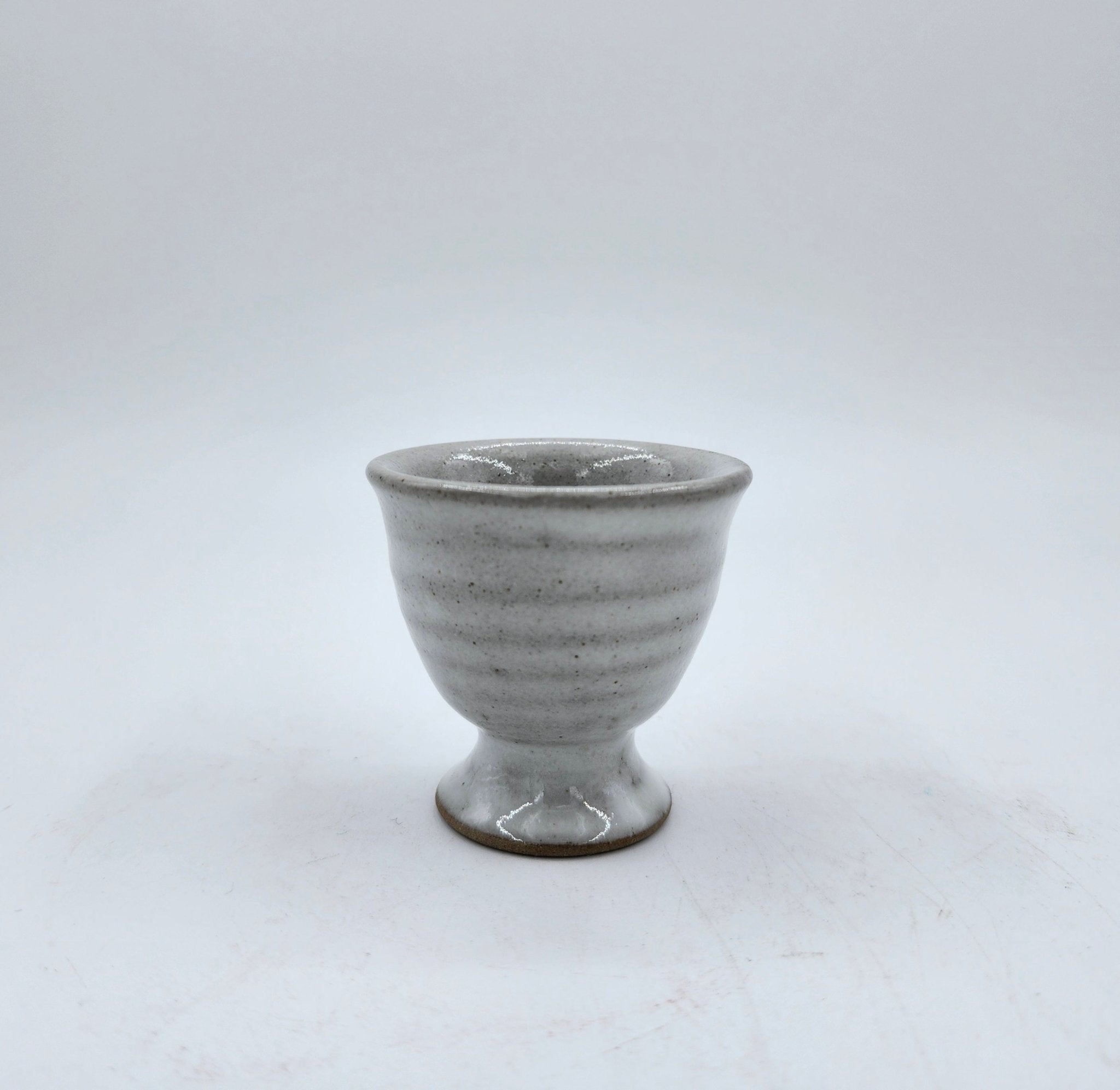 Grey ceramic egg cup, 5 cm diameter x 5 cm, detail view