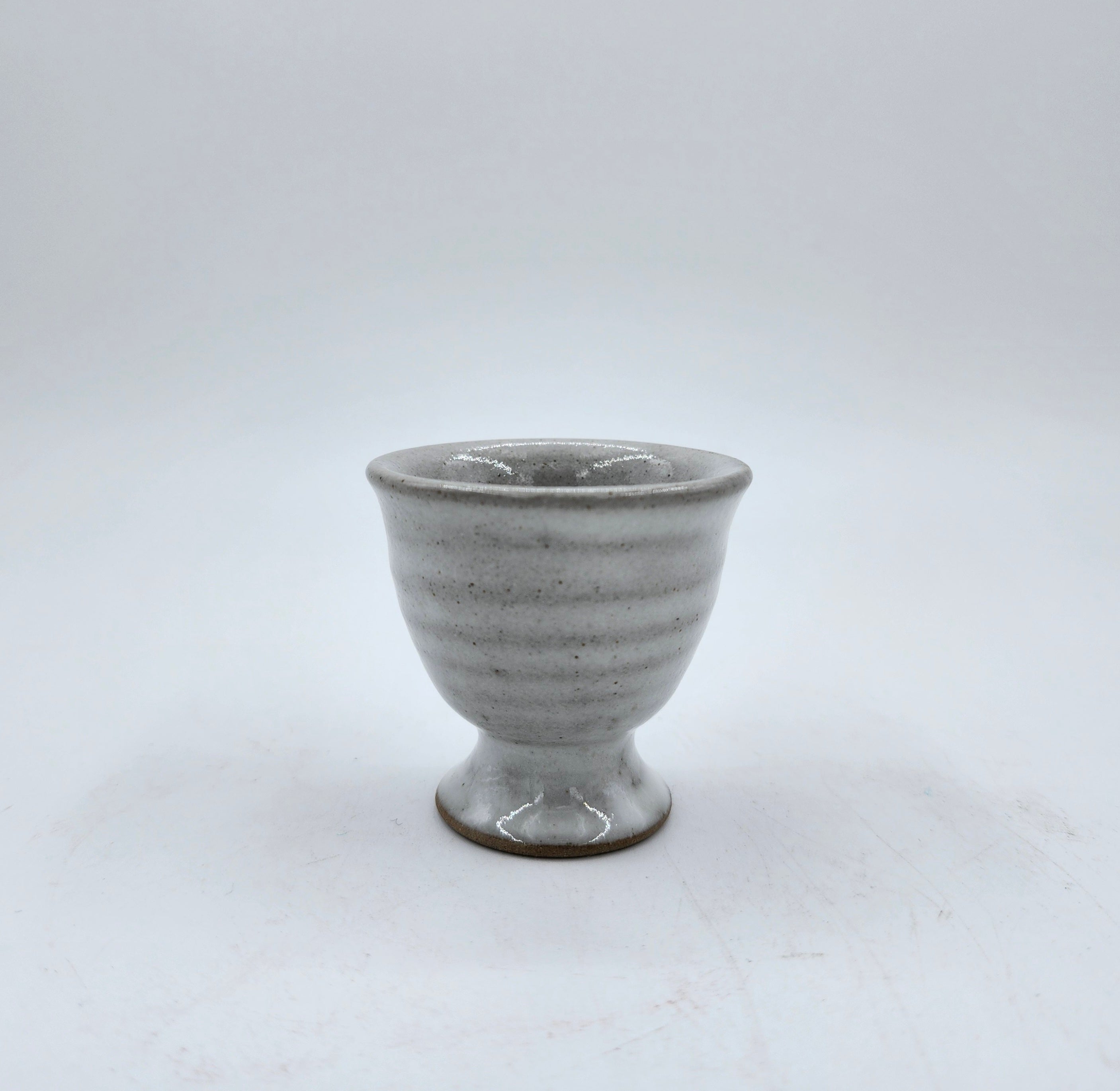 Grey ceramic egg cup, 5 cm diameter x 5 cm, detail view