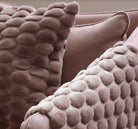 Dusty pink Egg Velvet Cushion by Ceannis, 50 x 50 cm, close-up of eggshell pattern fabric