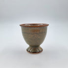Jade ceramic egg cup for boiled eggs, from a range of six pastel colours, 5 cm in diameter and 5 cm high