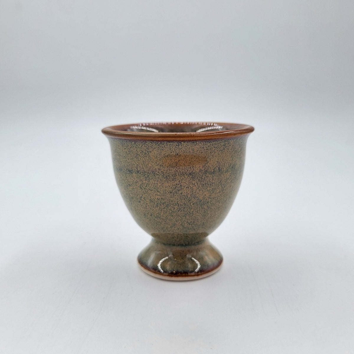 Jade ceramic egg cup for boiled eggs, from a range of six pastel colours, 5 cm in diameter and 5 cm high