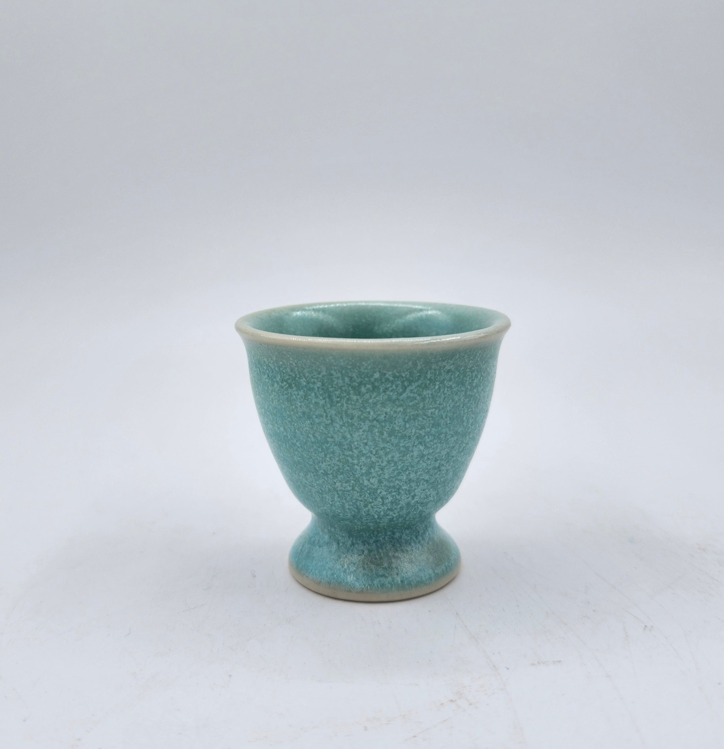 Teal ceramic egg cup, 5 cm diameter x 5 cm