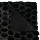 Black Egg Velvet Throw by Ceannis, 130 x 170 cm, draped to show eggshell pattern detail
