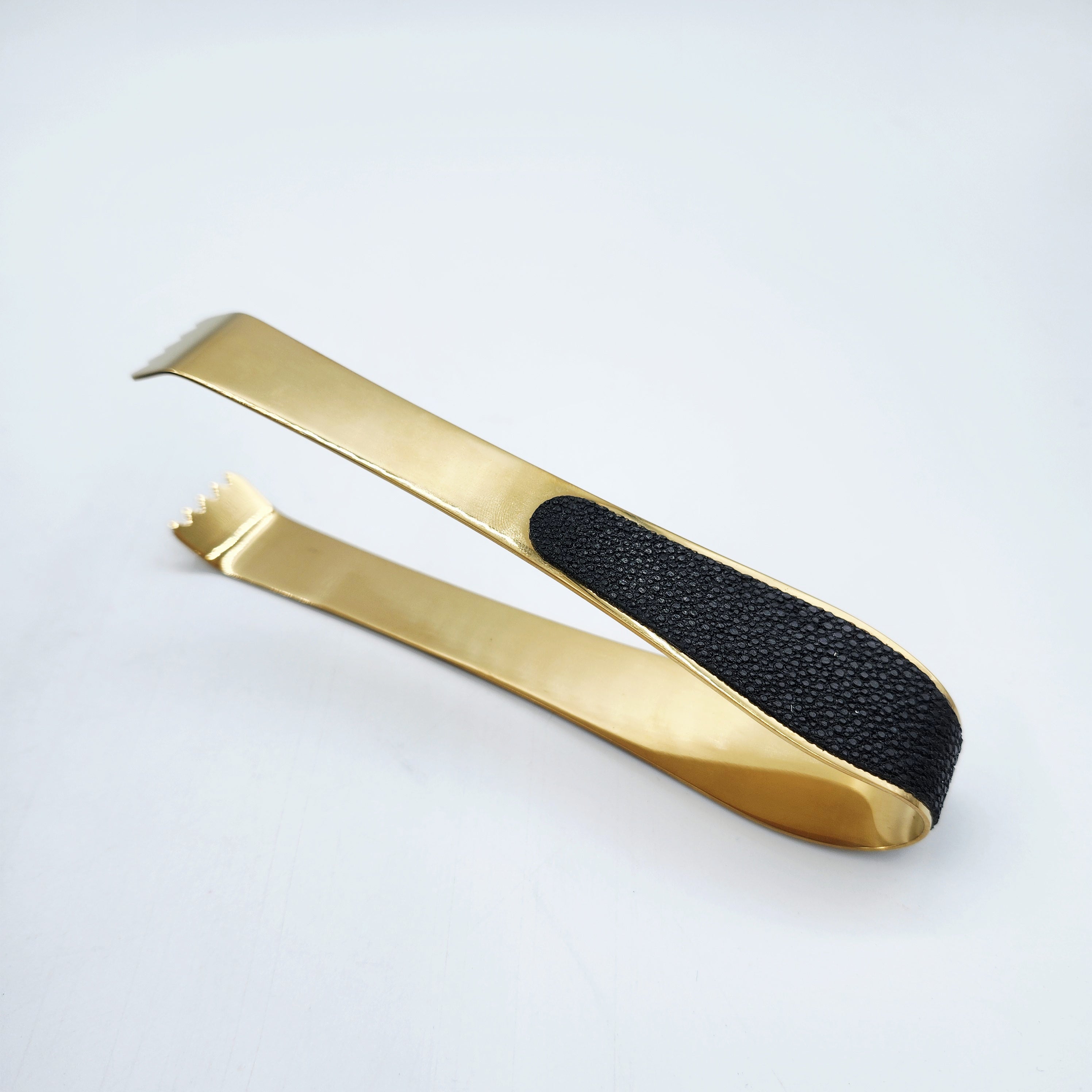Faux shagreen ice tongs in caviar black by Forwood Design, brass-plated stainless steel