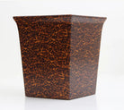 Tortoiseshell faux finish waste paper bin, styled