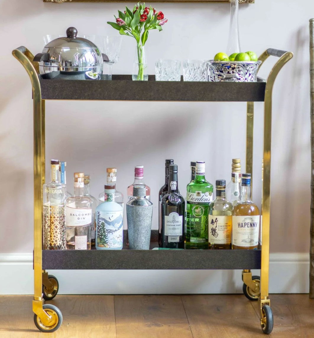 Seal brown faux shagreen Woodstock drinks trolley, engineered wheels detail