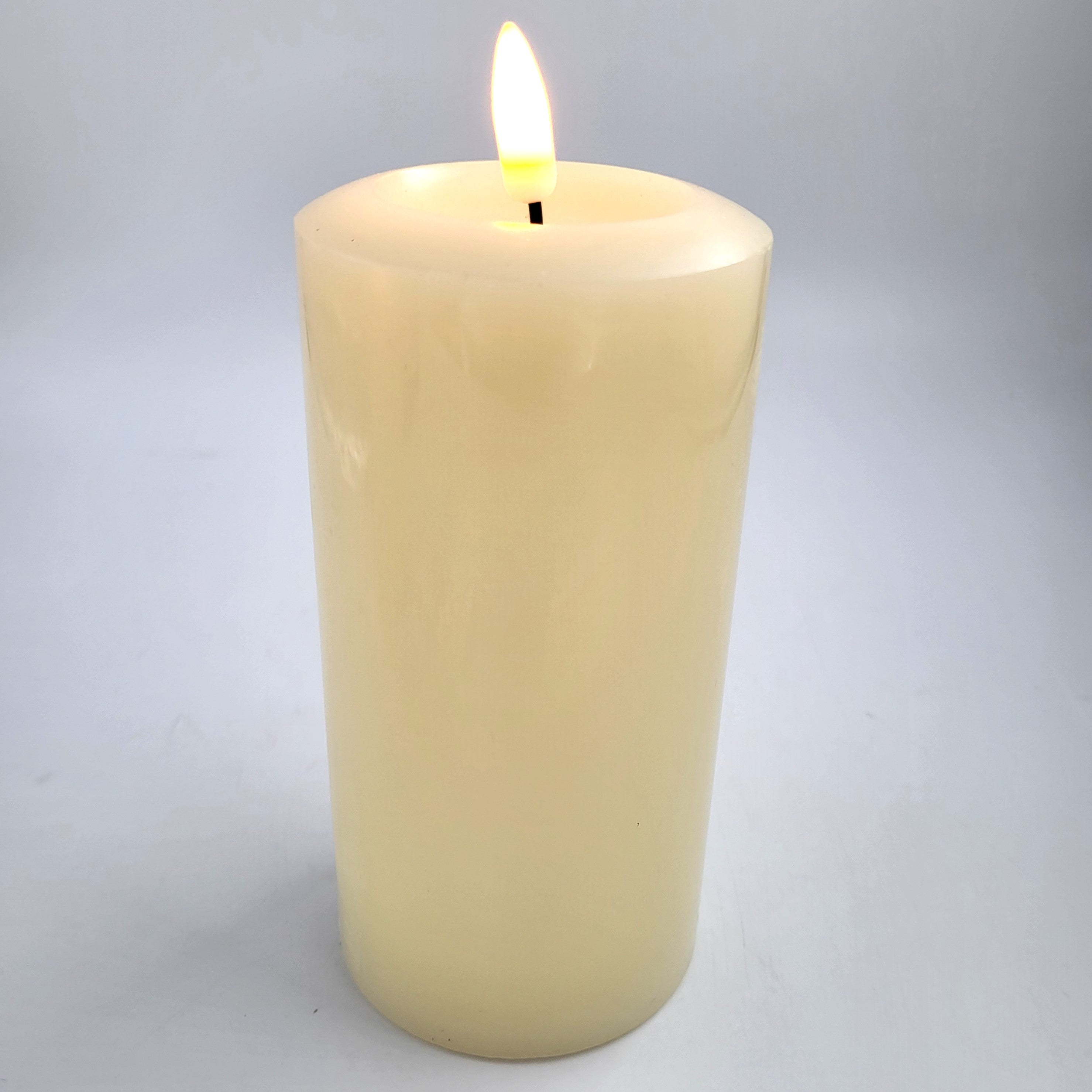 Flameless ivory pillar candle, detail of the realistic wax-effect finish
