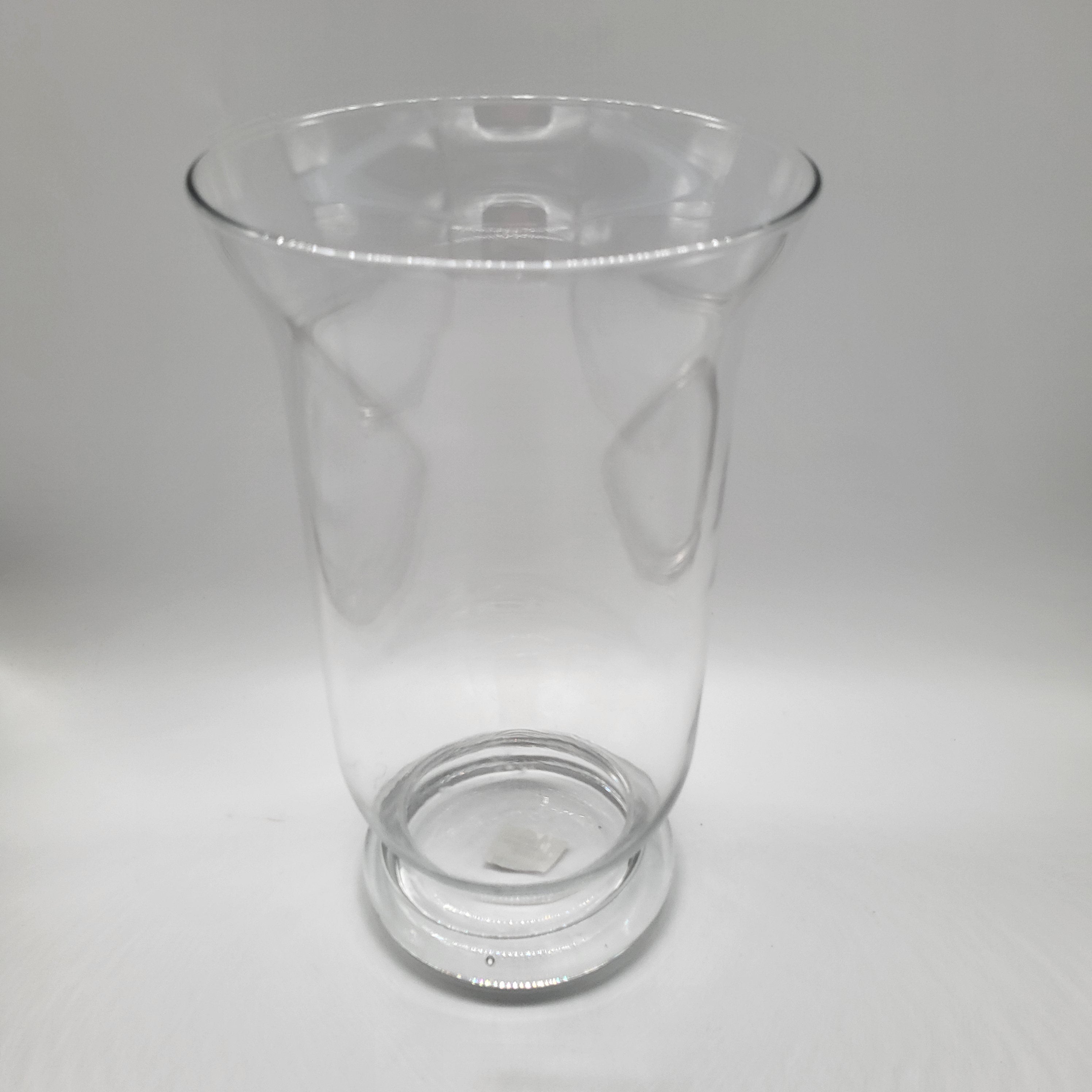 Clear glass vase or hurricane lamp, elegant design for flowers or a pillar candle