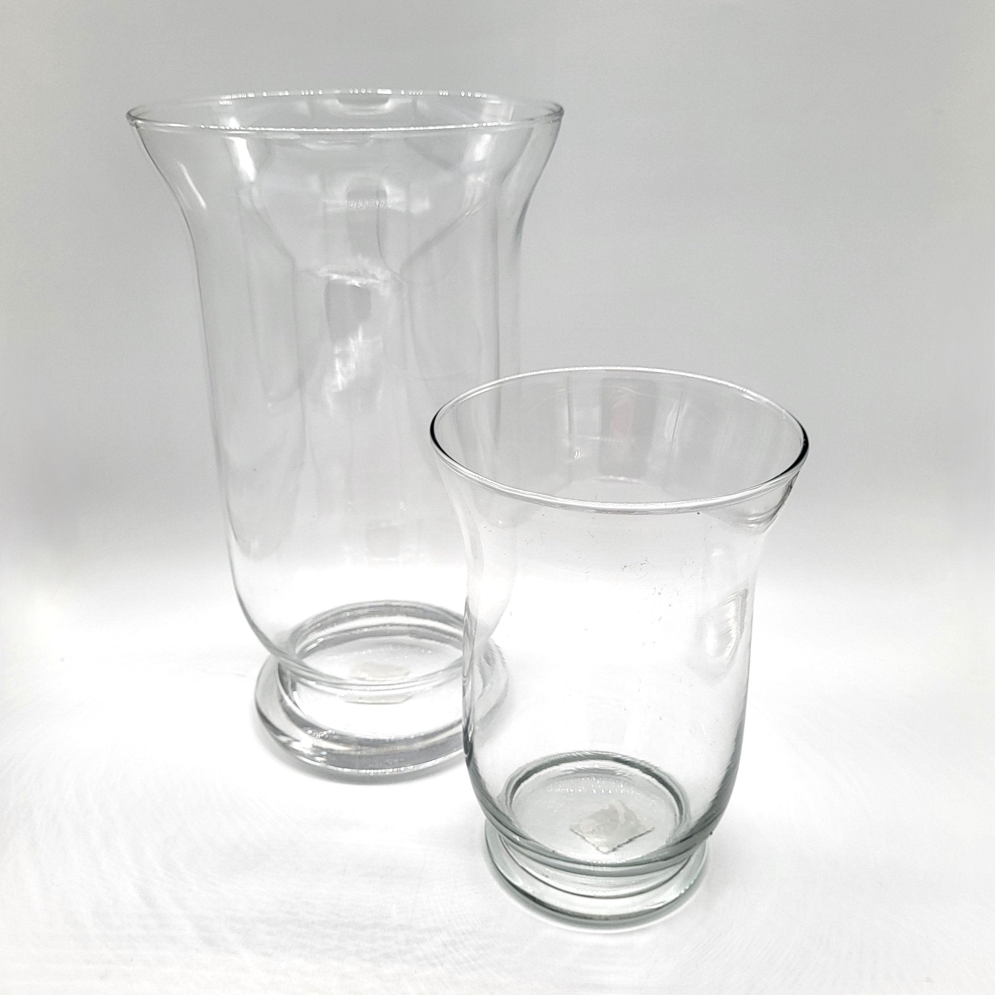 Glass vase or hurricane lamp, available in three sizes for flowers or candles