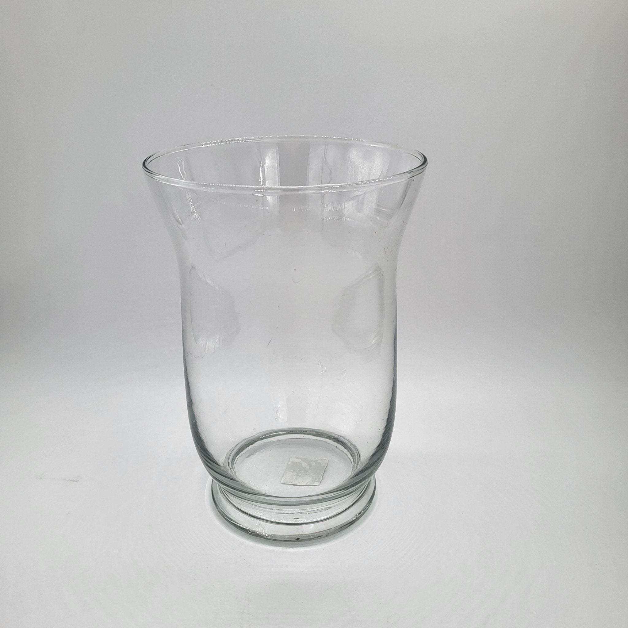 Glass vase or hurricane lamp styled with a candle, three sizes available