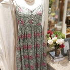 Block-print cotton sundress in a green floral pattern, one size