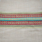 Lime striped 100% pashmina shawl, showing the deep hand-embroidered border and the side stitching.