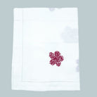 White cotton runner with a hemstitch border and red floral embroidery, 40 x 200 cm