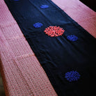 Coral and blue coral motif on black linen runner, hand embroidered, detail view