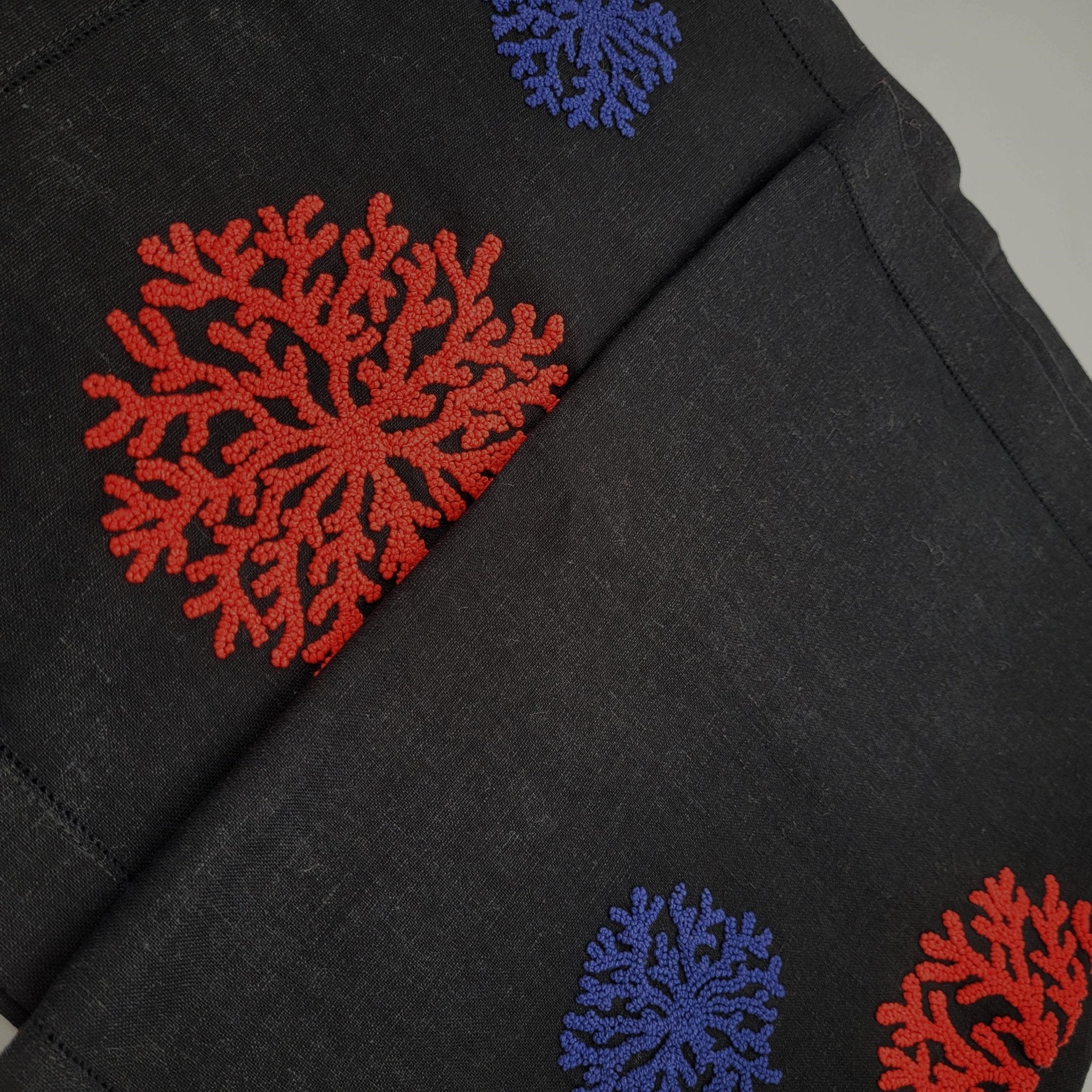 Hand embroidered linen table runner, coral motif in coral and blue on black, 38 x 200 cm