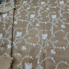 Hand-embroidered pashmina shawl, delicate floral on natural, draped