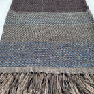 Handwoven linen and silk striped throw in cappuccino and sesame tones, fringed