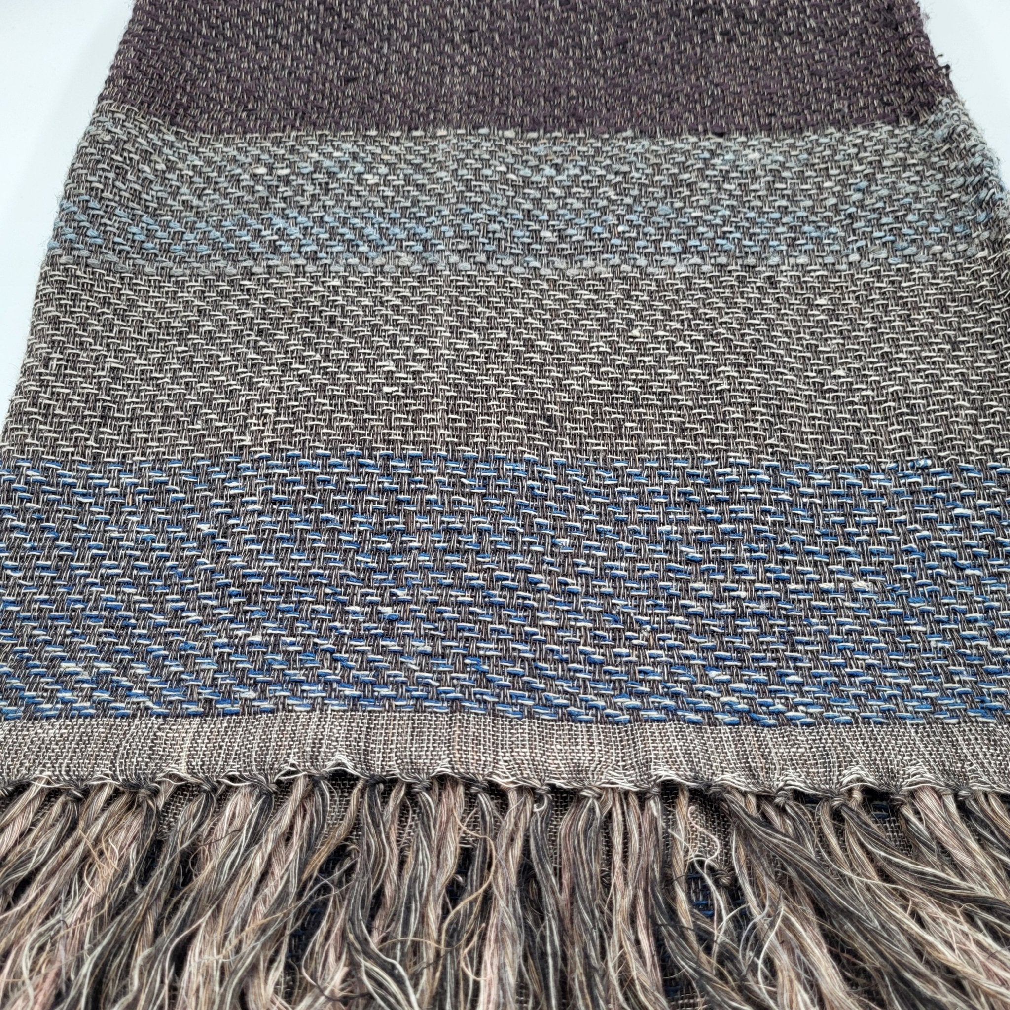 Handwoven linen and silk striped throw in cappuccino and sesame tones, fringed
