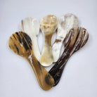 A group of horn spoons with natural patterns