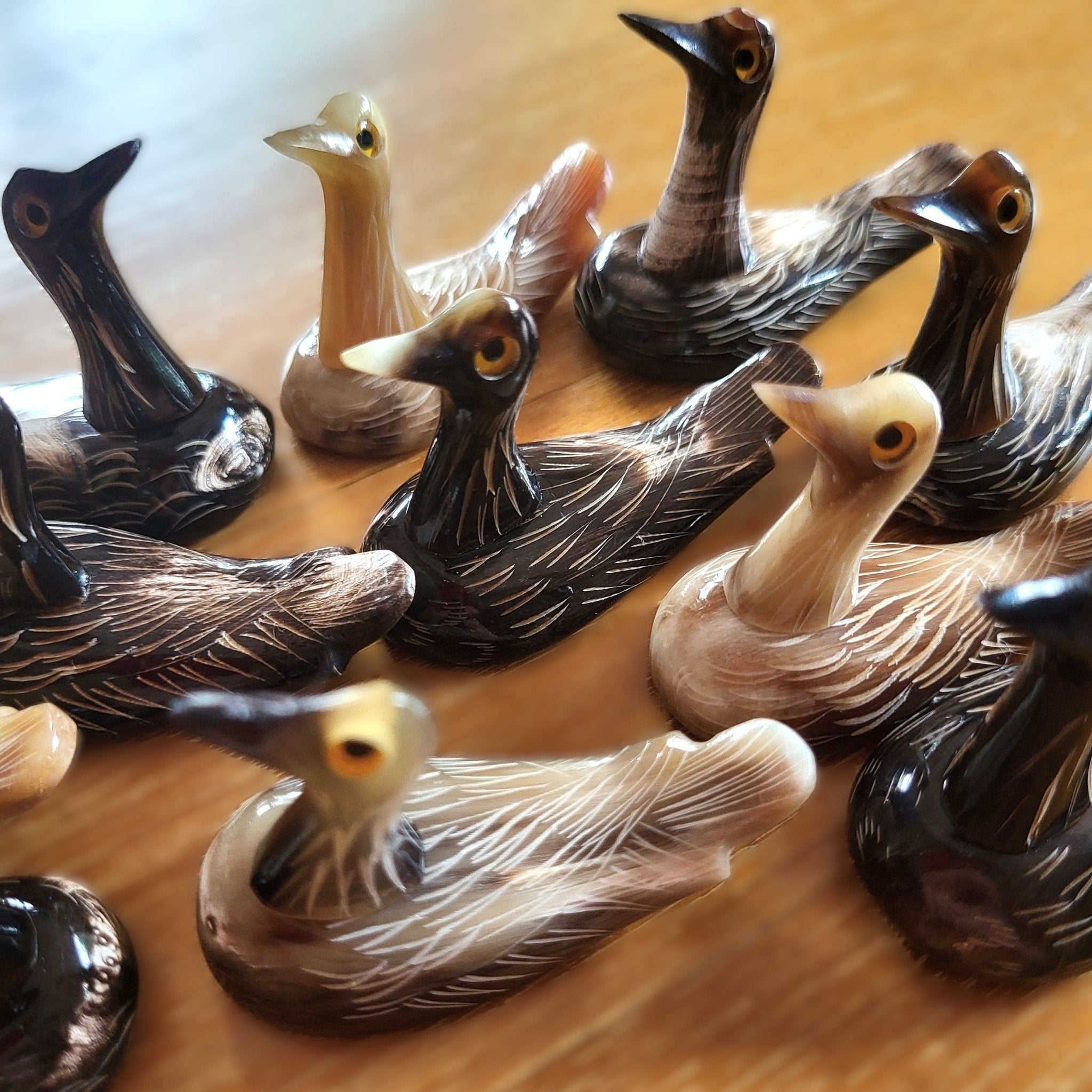 Horn chopstick stands shaped like ducks, handcrafted