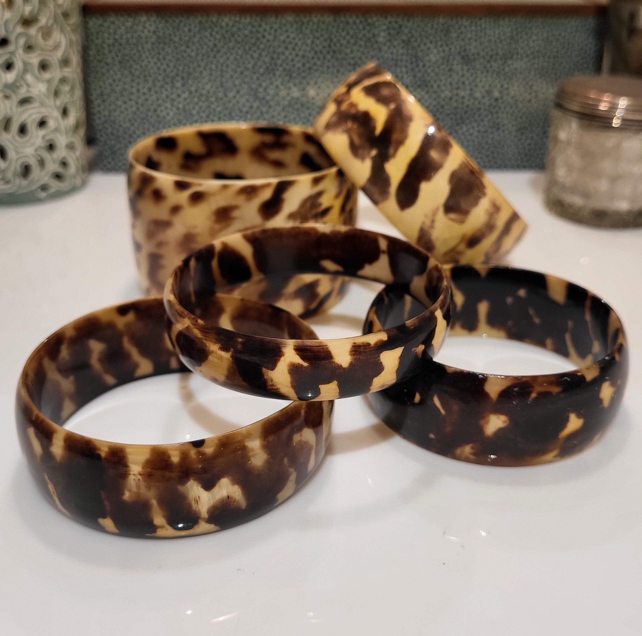 Buffalo horn bangle, tortoiseshell to tiger cowrie markings