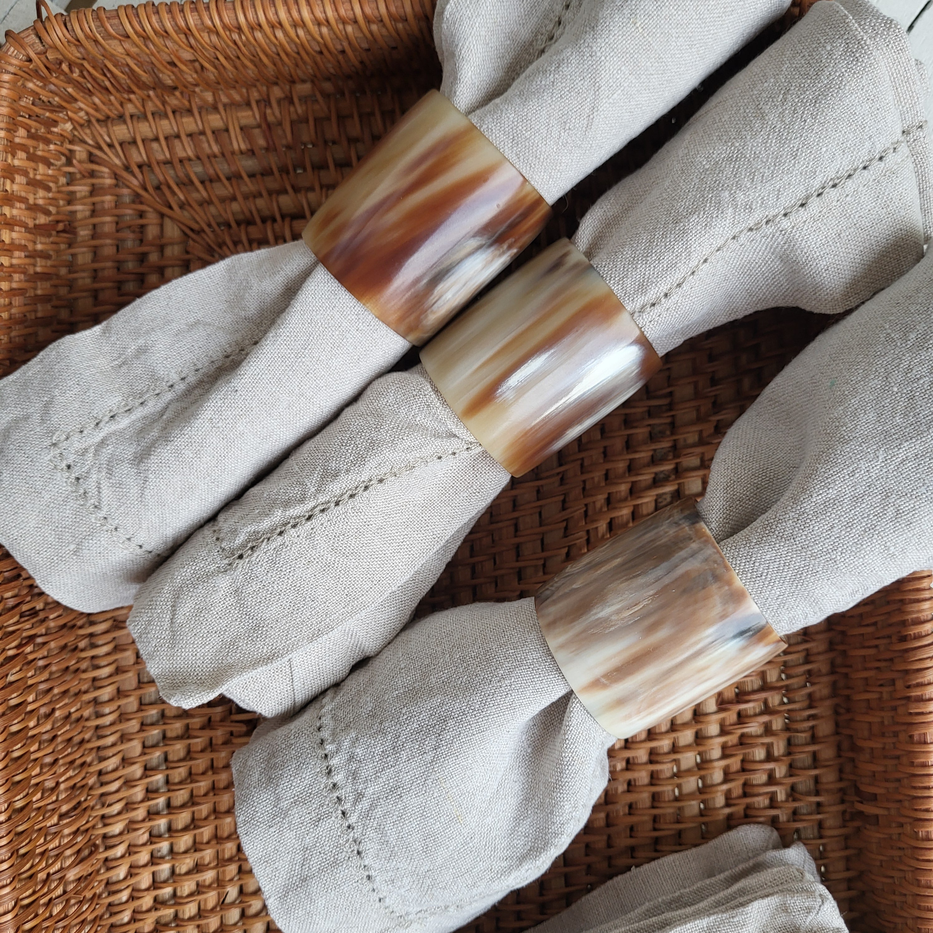 Handcrafted horn napkin ring, unique natural hues, carved horn