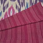 Reversible runner with Ikat on one side and woven stripes on the other