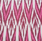 Ikat table runner with burgundy pink and white zigzag design
