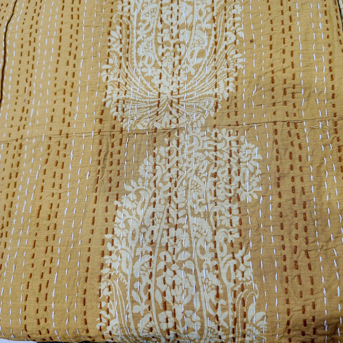 Mustard kantha single quilt in hand stitched cotton block print, 150 by 225cm, usable as a light throw.