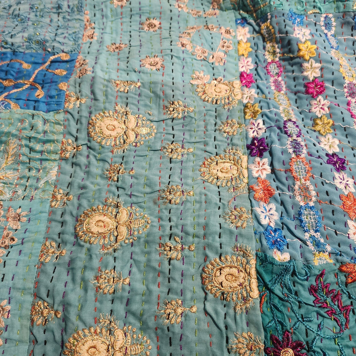 Blue kantha patchwork single quilt, floral cotton block prints hand stitched into a light quilt or throw, 150 by 225cm