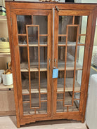 Vintage teak Art Deco cabinet with geometric glass doors and brass handles, 135 x 81cm